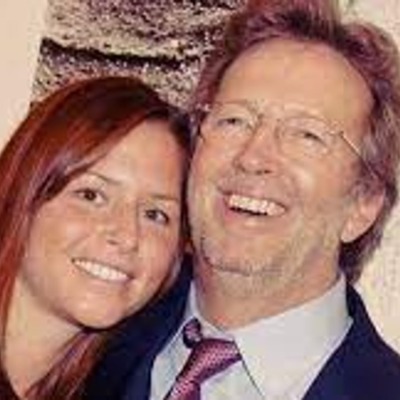 Melia McEnery and Eric Clapton are happy in relationship.